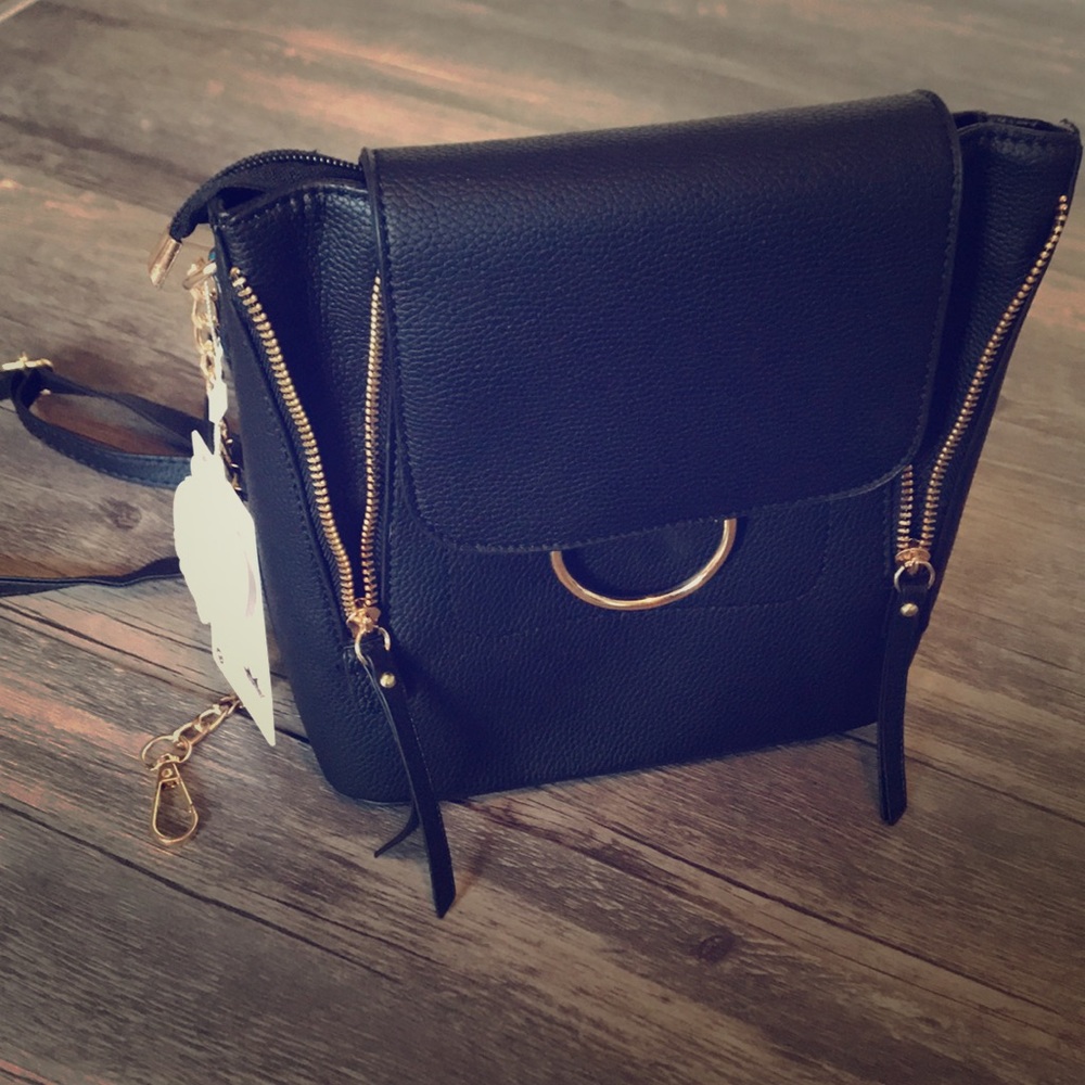 Fashion backpack with interchangeable straps